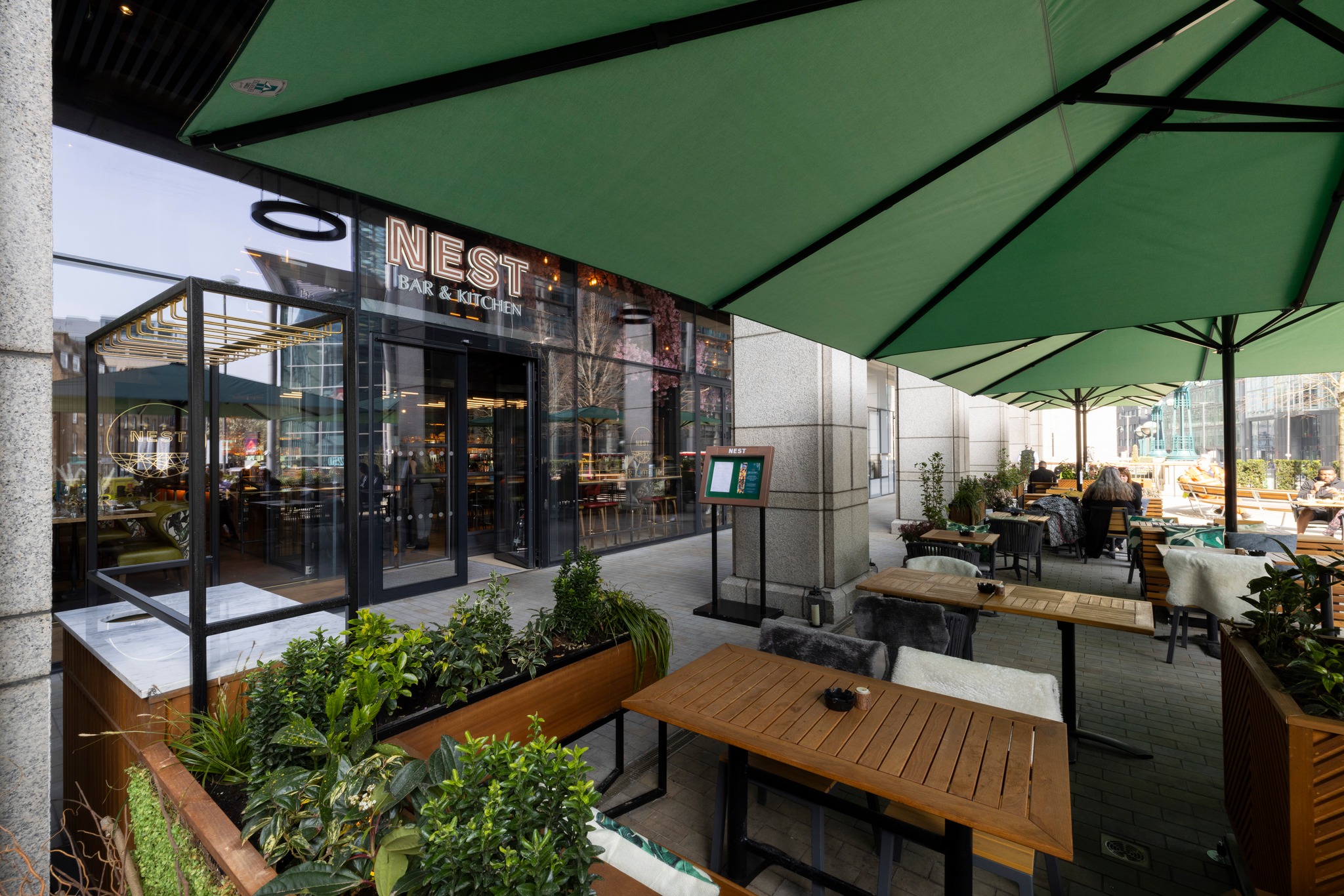 Outdoor dining area at Nest bar